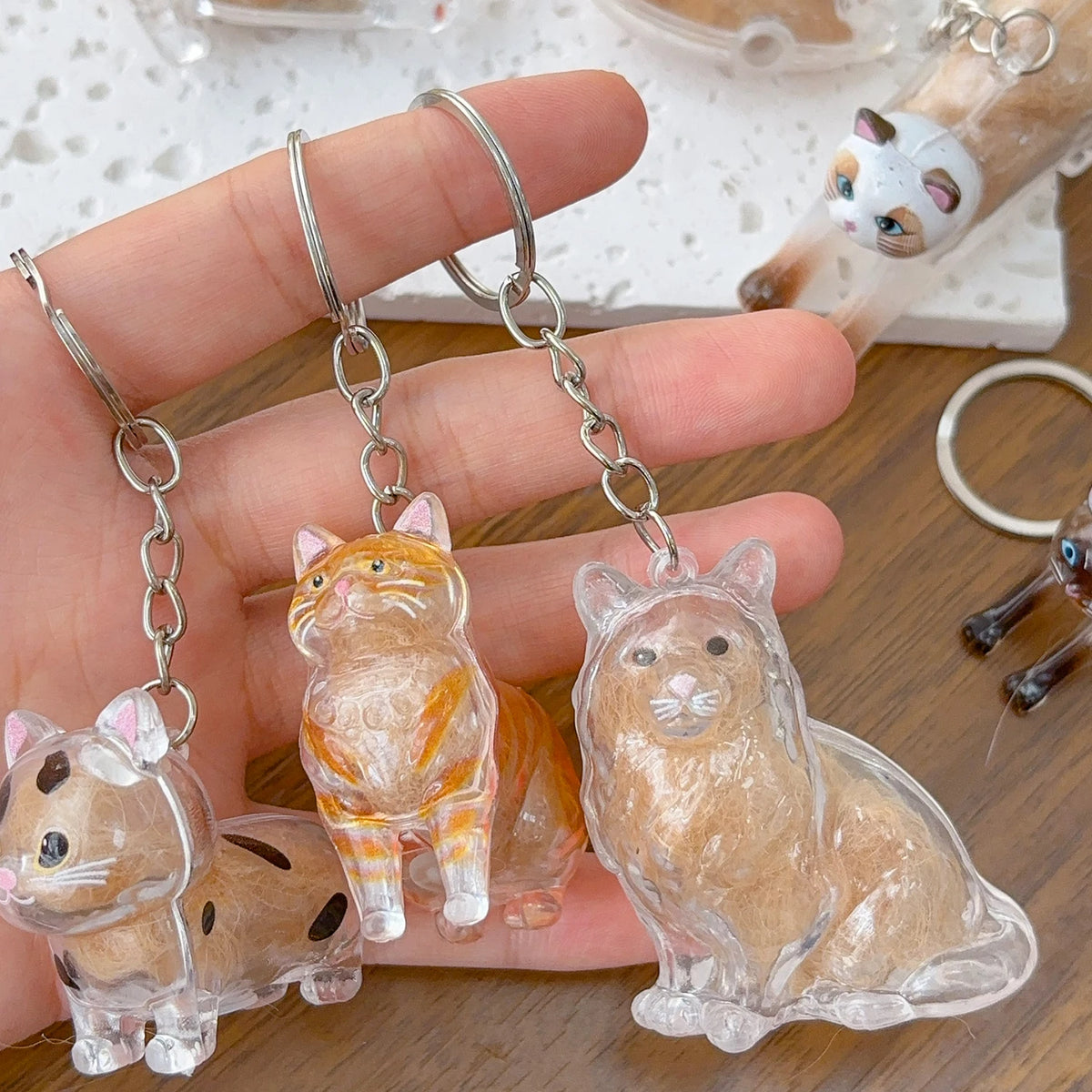 Capsule souvenir pour poils de chat avec porte-clés